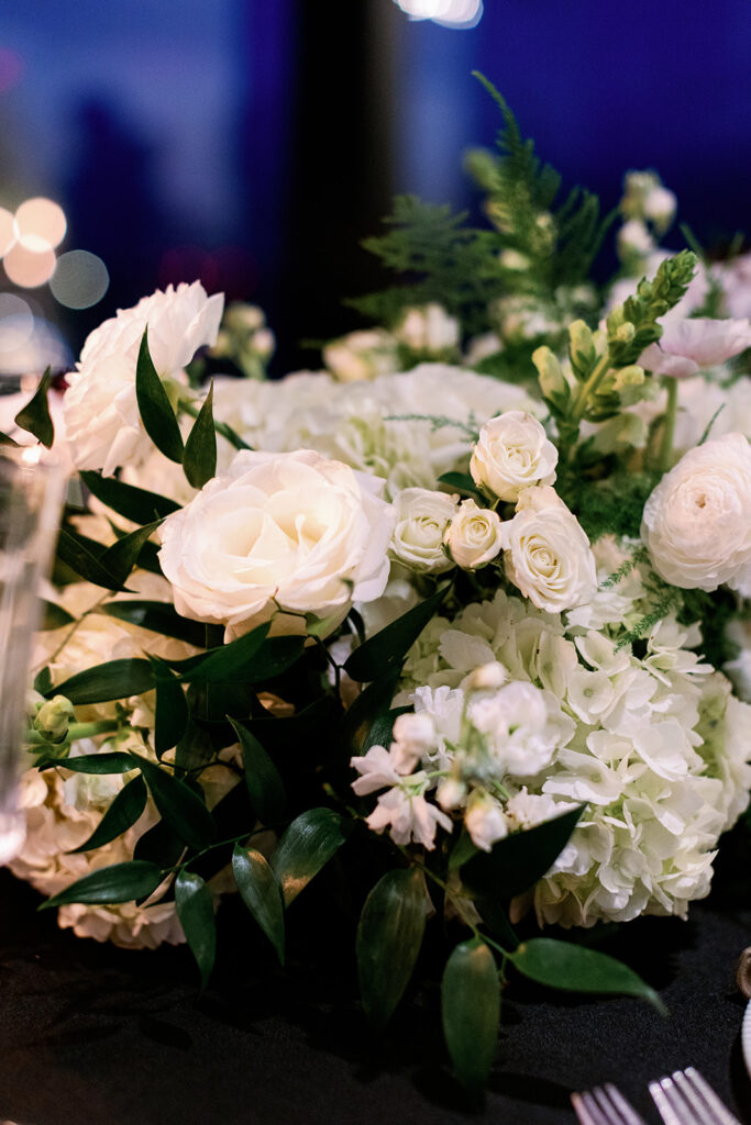 Elegant winter wedding reception table flowers. 
