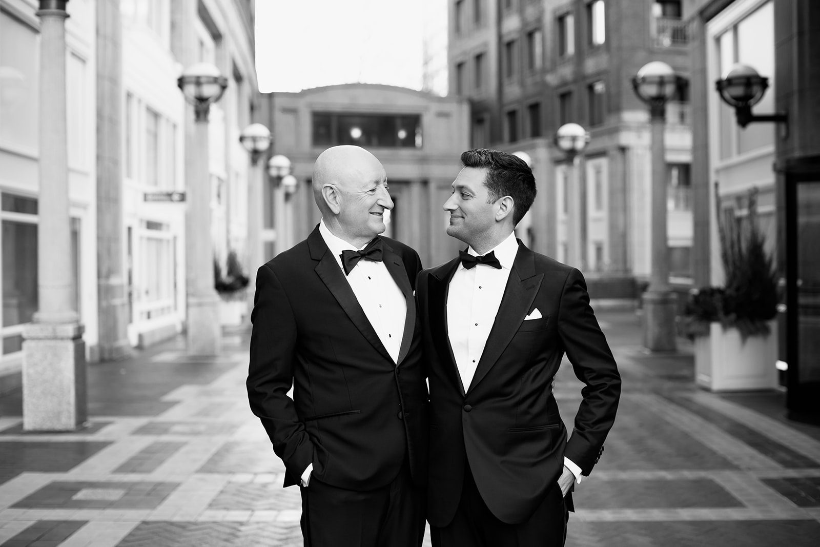 Groom and dad portrait outside the Boston Harbor Hotel. 