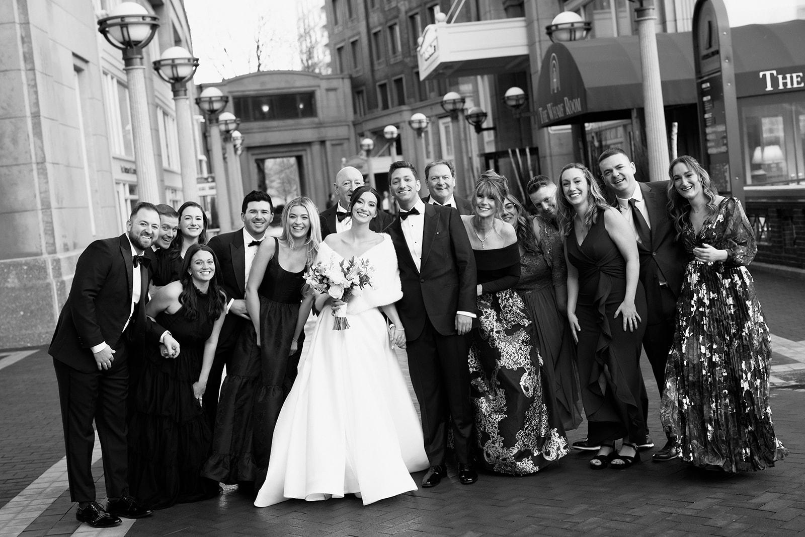 Wedding family group photo outside the Boston Harbor Hotel. 