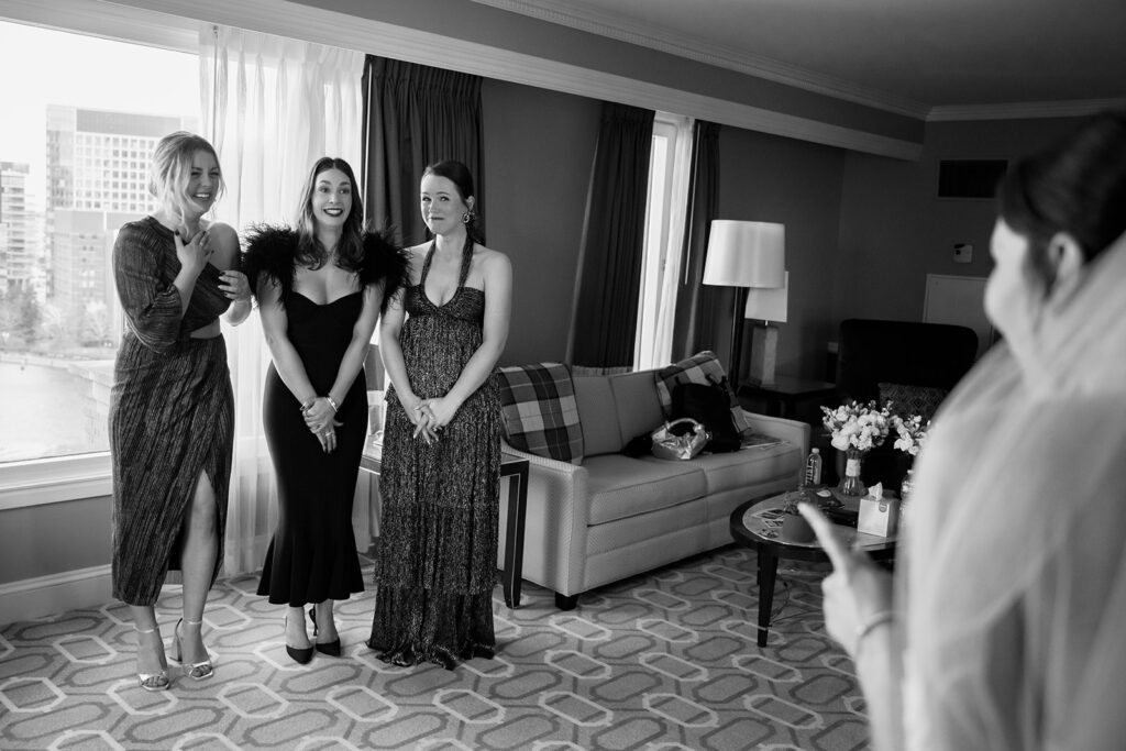 Bride first look with her 3 best friends at the Boston Harbor Hotel. 
