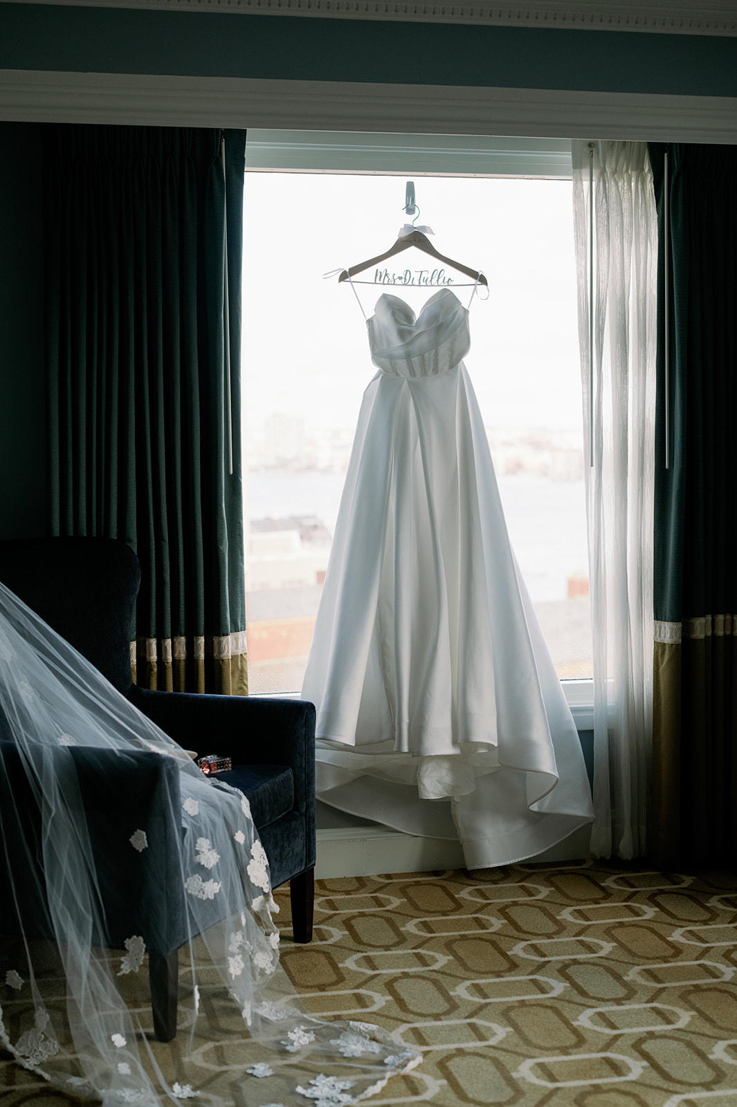 Cinematic wedding dress detail shot in a suite at the Boston Harbor Hotel. 
