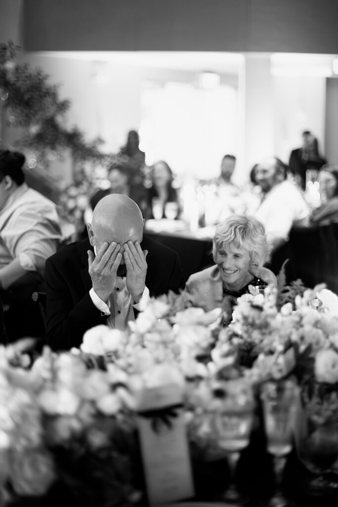 Candid wedding guest photo during a Boston State Room wedding reception.