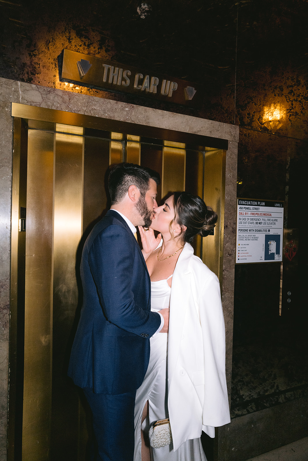 Beacon Grand Hotel San Francisco elevator engagement photoshoot. 