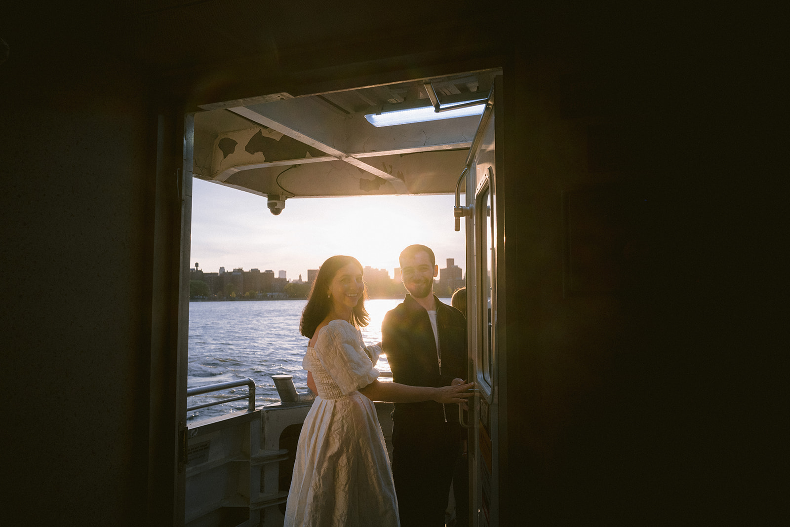 Romantic sunset ferry boat engagement photoshoot. 