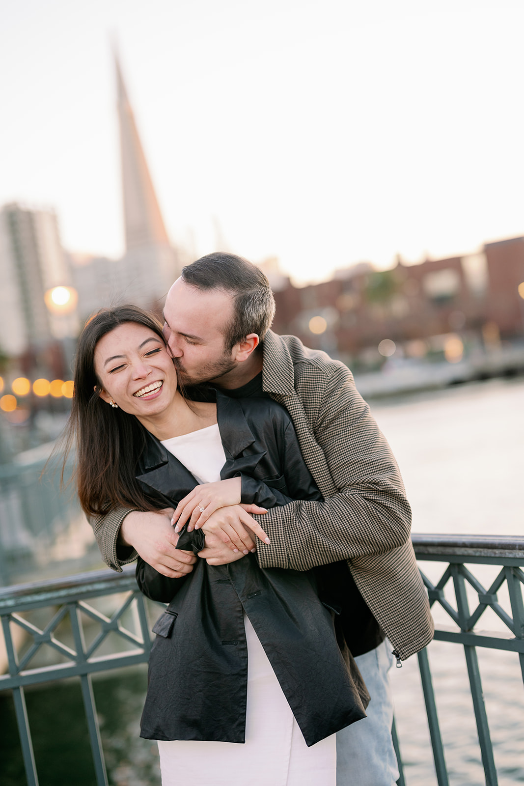 Sunset couples photoshoot at Pier 17 in San Francisco, California. 