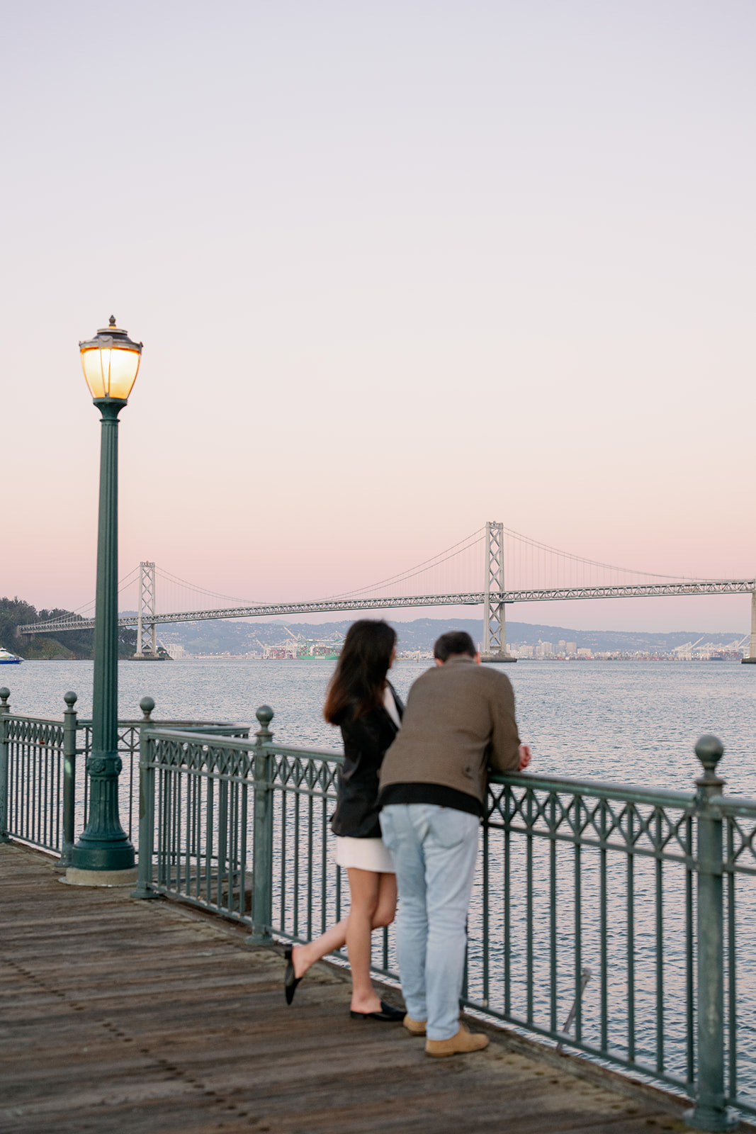 Sunset engagement session at Pier 17 in SF Bay Area, California. 