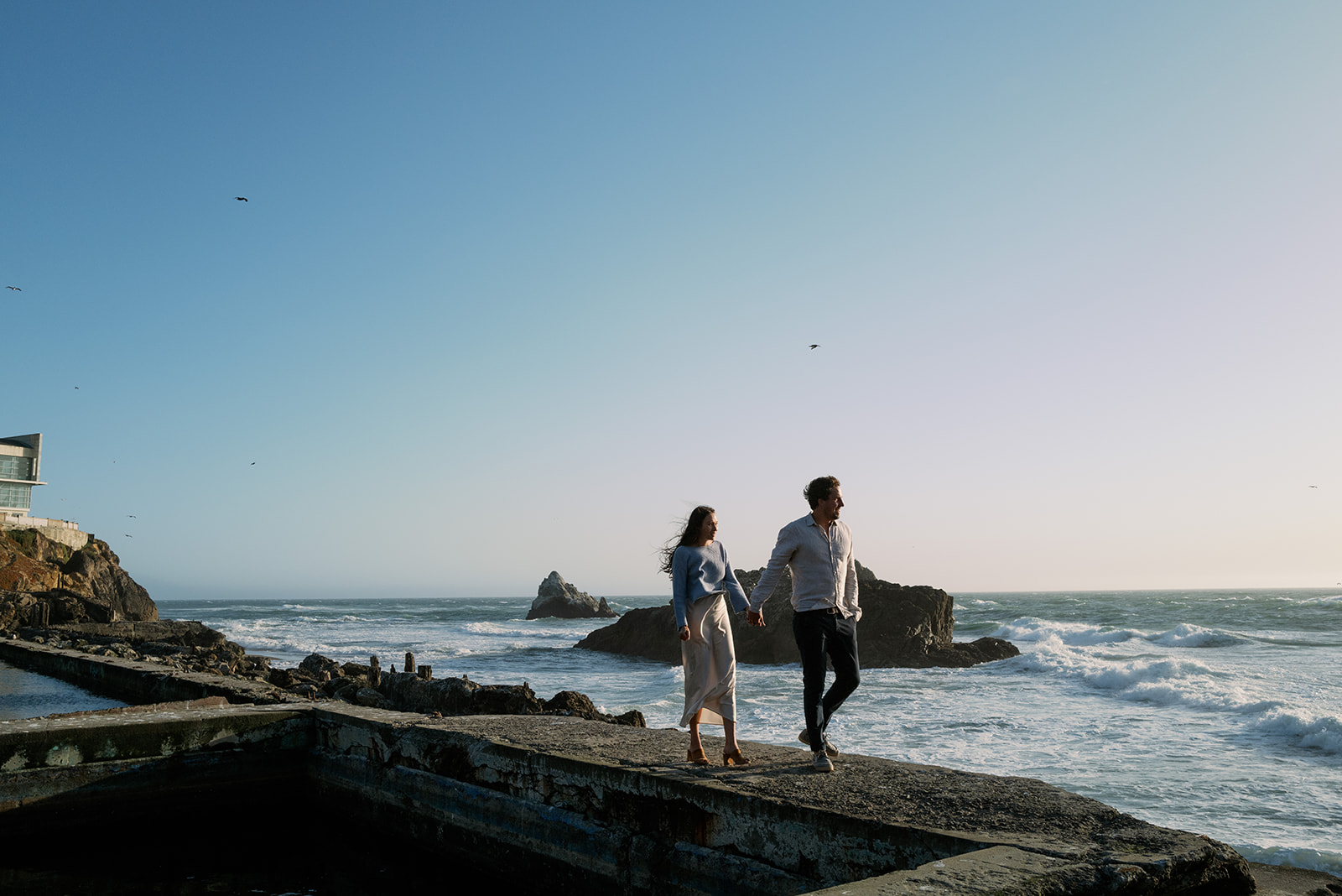 Bay Area sunset couples photoshoot at Sutro Baths in San Francisco.