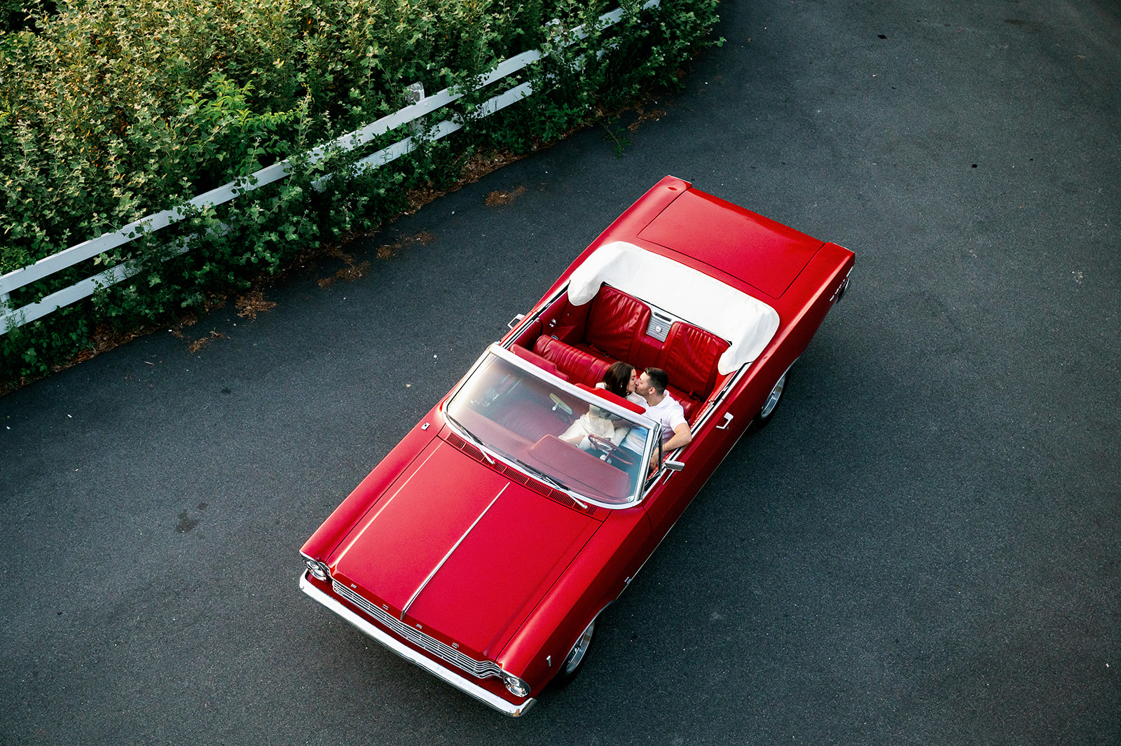 Cinematic red vintage car engagement session in San Francisco. 